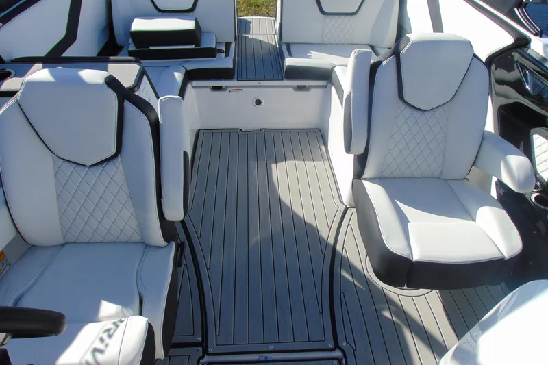 Slide: The Image of 2026 Yamaha Boats 252SD interior with luxurious white seating and sleek design. - 25