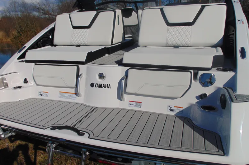 Slide: The Image of 2026 Yamaha Boats 252SD rear deck with sleek seating and modern design. - 7