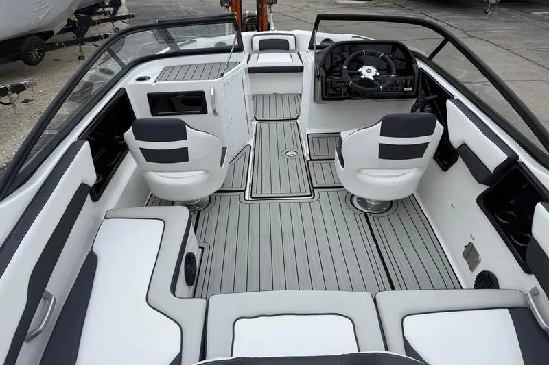 Slide: The Image of 2026 Yamaha Boats 195S interior with sleek seating and modern dashboard design. - 5