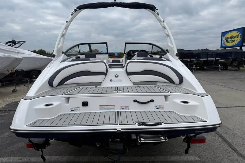 Slide: The Image of Interior view of 2026 Yamaha Boats 195S, featuring sleek dashboard and modern steering wheel. - 6