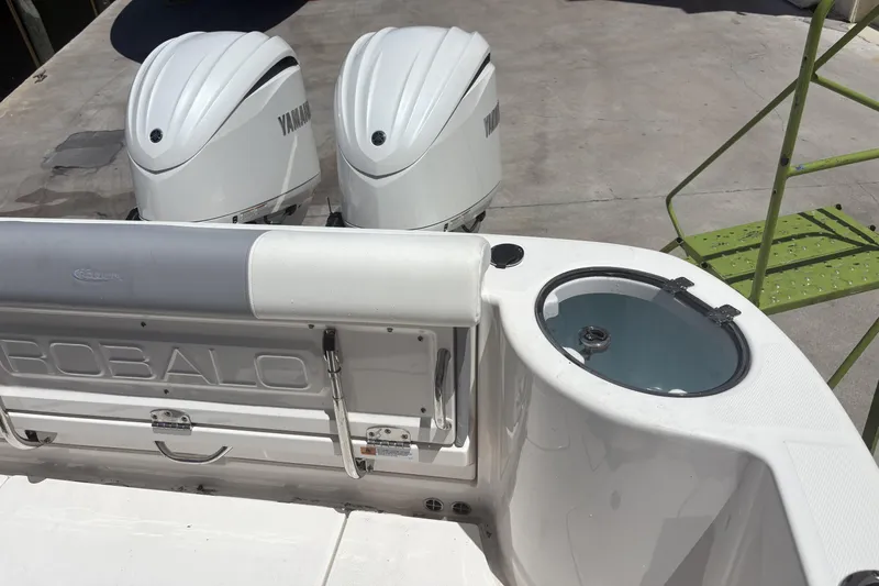 Slide: The Image of 2023 Robalo R302 Center Console with Yamaha engines and livewell. - 7