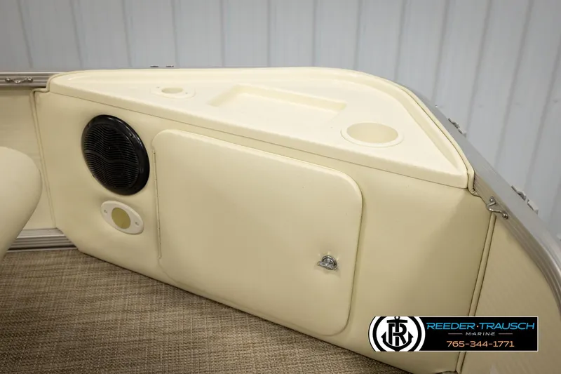 Slide: The Image of 2008 Bennington 2050 FSI boat interior with speaker and storage compartment. - 37