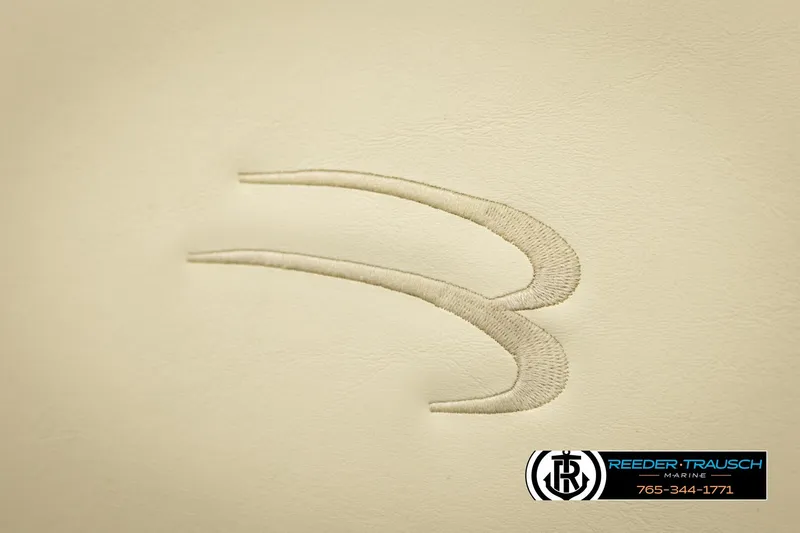 Slide: The Image of Embroidered Bennington logo on beige upholstery, 2008 Bennington 2050 FSI boat. - 41