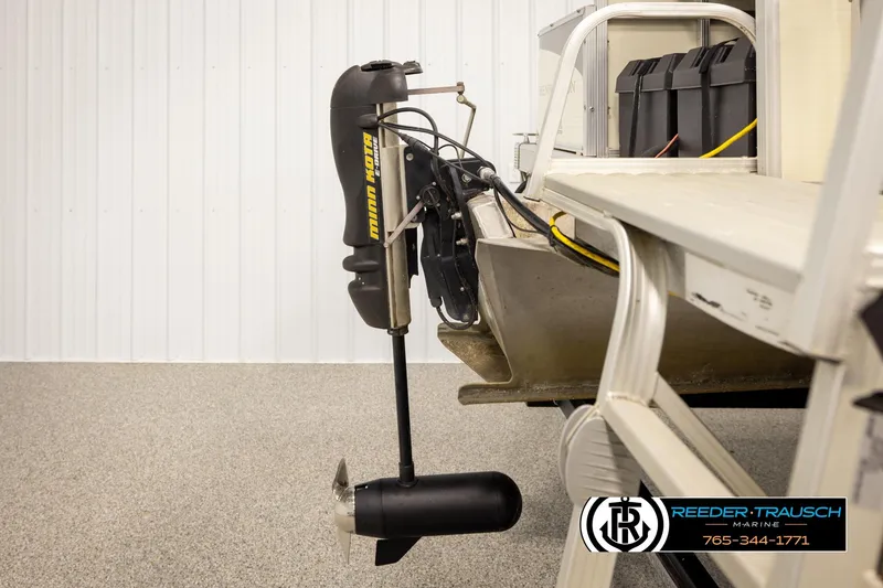 Slide: The Image of 2008 Bennington 2050 FSI boat with Minn Kota trolling motor in showroom. - 43