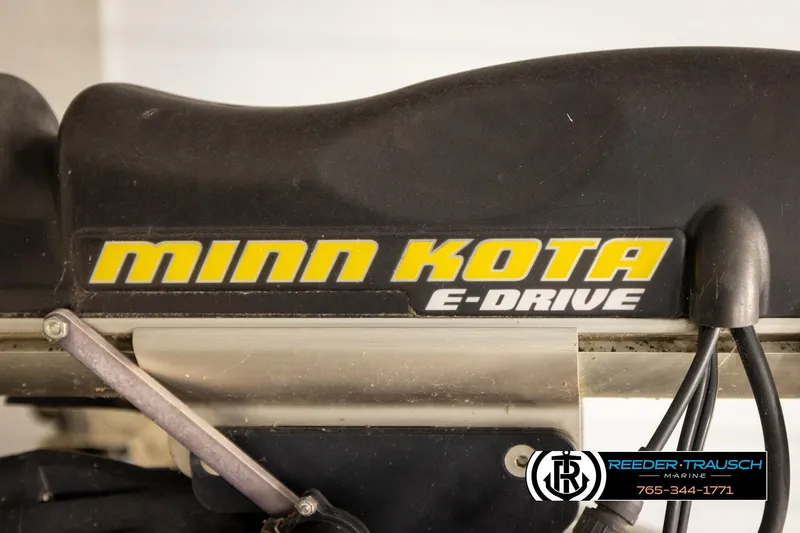 Slide: The Image of Minn Kota E-Drive motor on 2008 Bennington 2050 FSI boat, Reeder-Trausch Marine logo visible. - 44