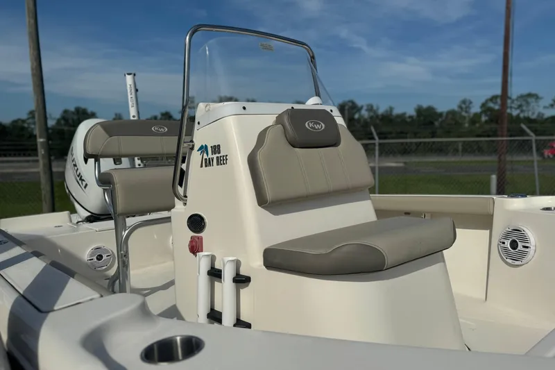 Slide: The Image of 2024 Key West 188 Bay Reef boat interior with seating and console. - 6