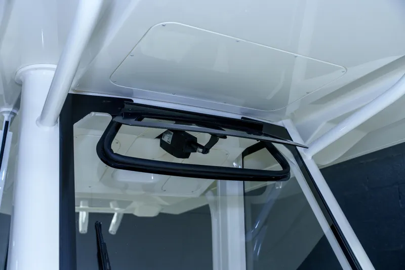 Slide: The Image of 2023 Regulator 28 boat interior with Garmin electronics in a showroom. - 32