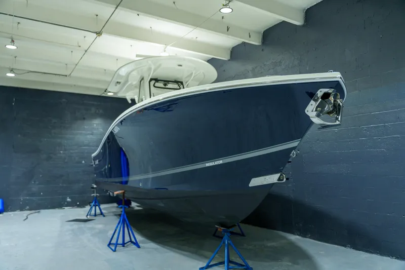 Slide: The Image of Twin Yamaha 300 V6 outboard engines on a 2023 Regulator 28 boat. - 4