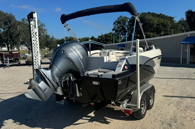 Slide: The Image of 2022 Starcraft SVX 191 OB boat with Yamaha outboard motor on trailer. - 3