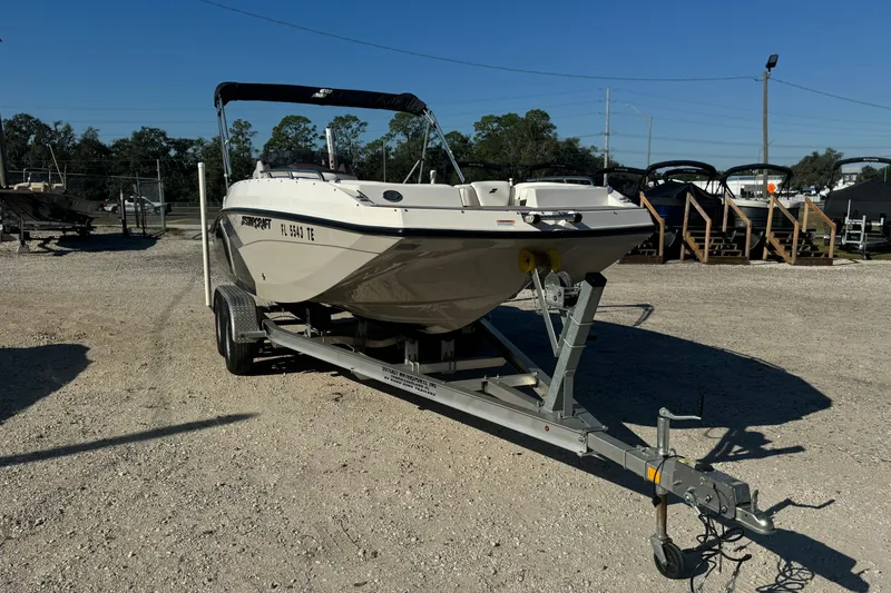 Slide: The Image of 2022 Starcraft SVX 191 OB boat on trailer in outdoor lot. - 4