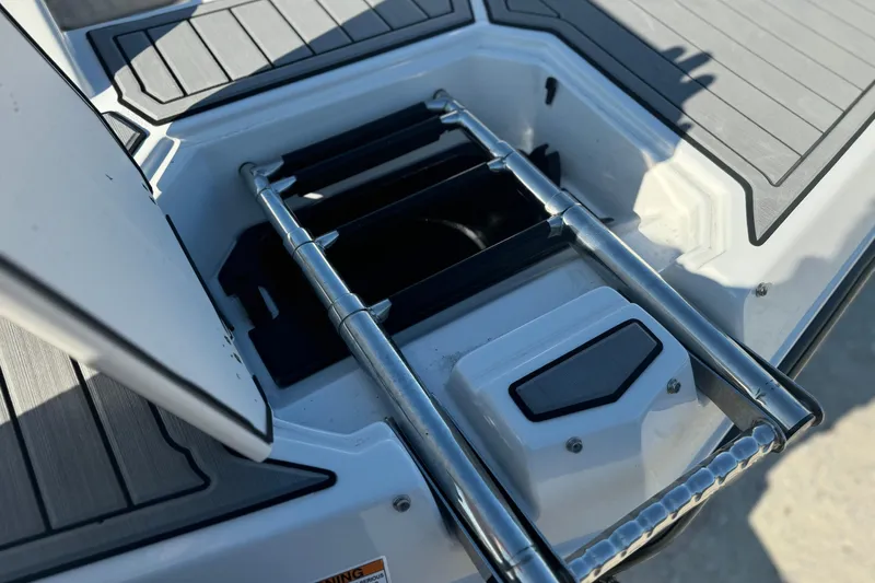 Slide: The Image of 2022 Starcraft SVX 191 OB boat ladder and deck detail. - 9