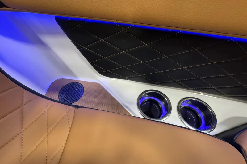 Slide: The Image of 2026 Chaparral 6 SSX interior with quilted leather, blue LED lighting, and chrome accents. - 33