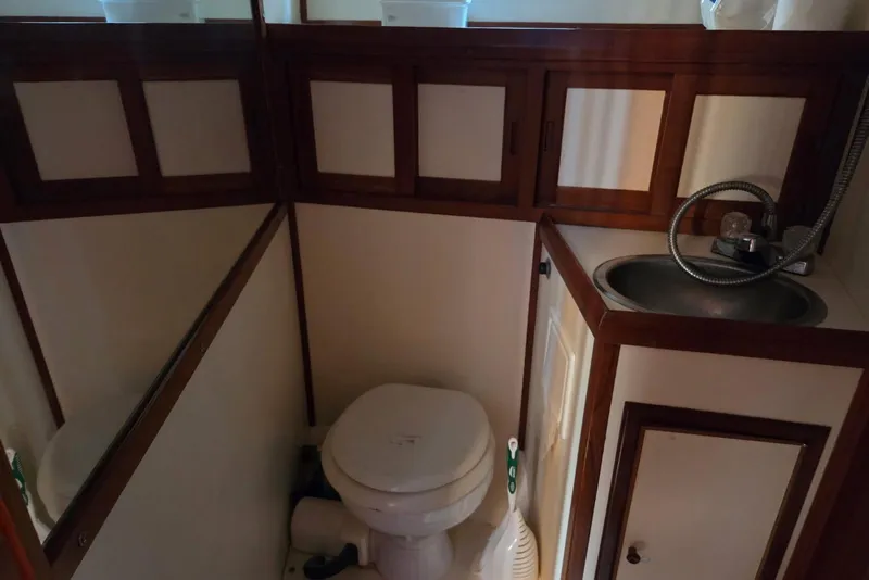 Slide: The Image of 1988 Novamarine 36 Heritage East Trawler bathroom with sink and toilet. - 13