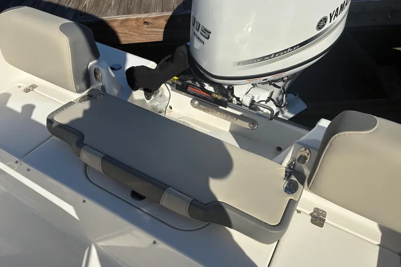 Slide: The Image of 2026 Key West 189 FS boat with Yamaha outboard motor, featuring comfortable seating. - 10