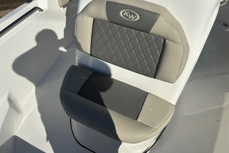 Slide: The Image of 2026 Key West 189 FS boat seat with gray and beige upholstery, featuring diamond stitching. - 17