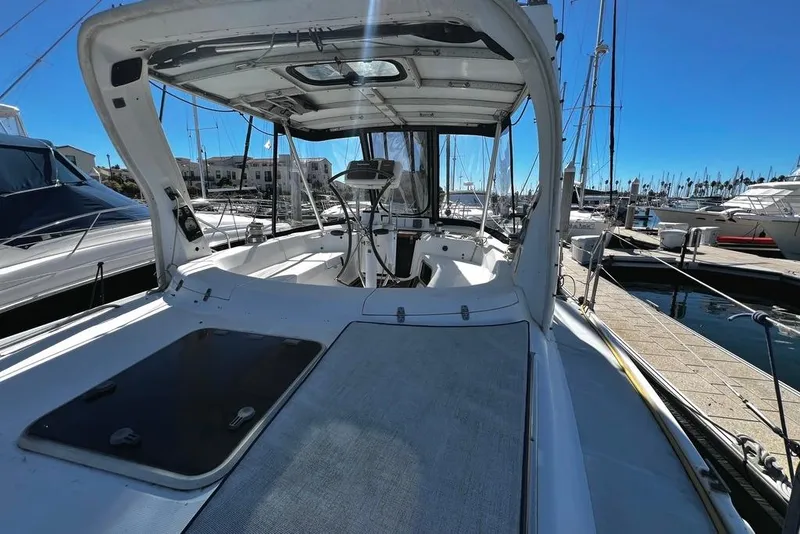 Slide: The Image of Cockpit of 1999 Hunter Passage 420 sailboat docked at marina. - 12