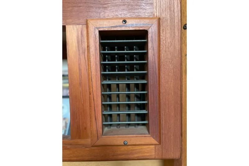 Slide: The Image of Engine of a 1999 Hunter Passage 420 sailboat, featuring Yanmar components. - 30