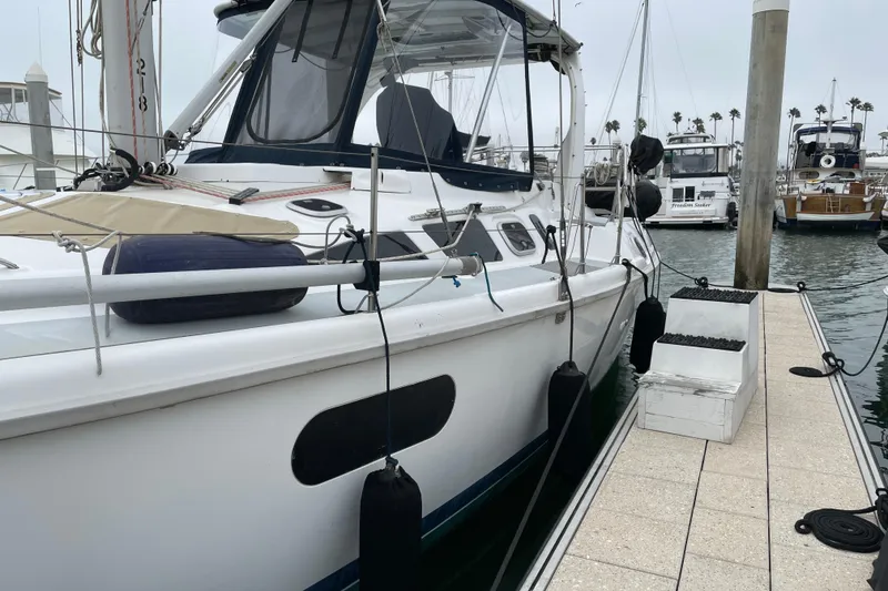 Slide: The Image of Sailboat docked in marina, 1999 Hunter Passage 420, clear sky background. - 6