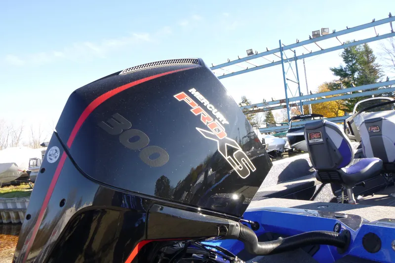 Slide: The Image of 2026 Ranger 621FS Pro boat with Mercury 300 Pro XS engine, outdoor display. - 13