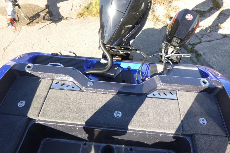 Slide: The Image of 2026 Ranger 621FS Pro boat deck with motor, featuring sleek design and modern equipment. - 17