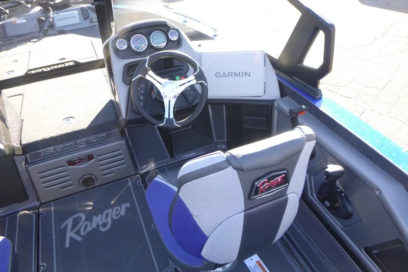 Slide: The Image of 2026 Ranger 621FS Pro boat interior with Garmin navigation system and branded seating. - 23