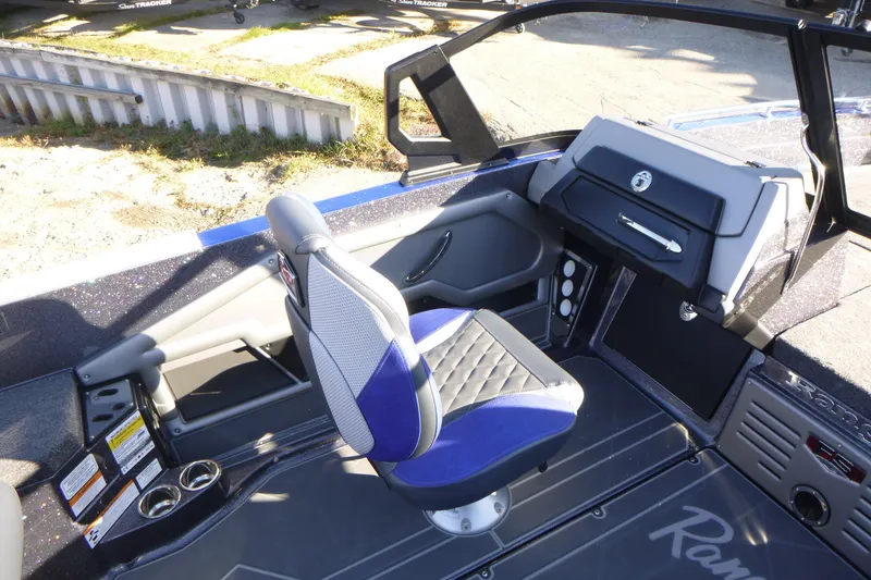 Slide: The Image of 2026 Ranger 621FS Pro boat interior with modern seating and dashboard design. - 27