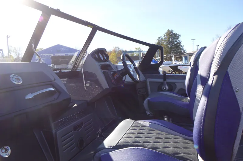 Slide: The Image of Interior of 2026 Ranger 621FS Pro boat with modern dashboard and seating. - 28