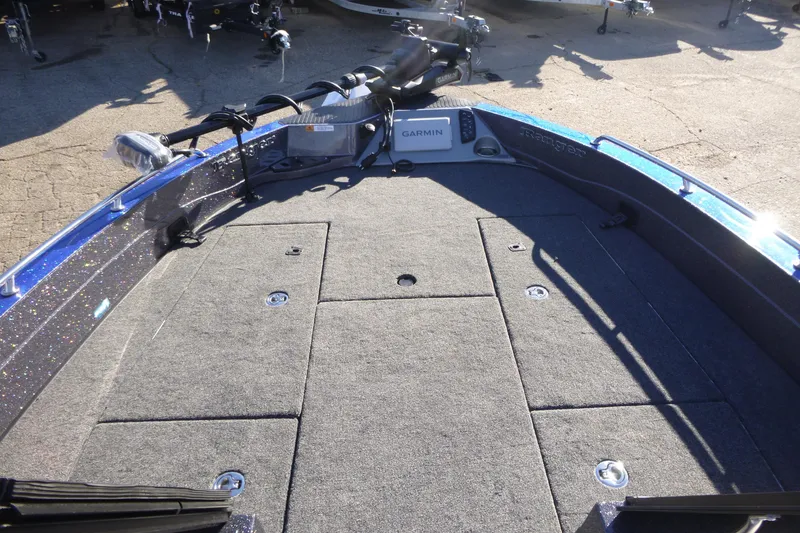 Slide: The Image of 2026 Ranger 621FS Pro boat deck with Garmin equipment, featuring spacious storage compartments. - 33