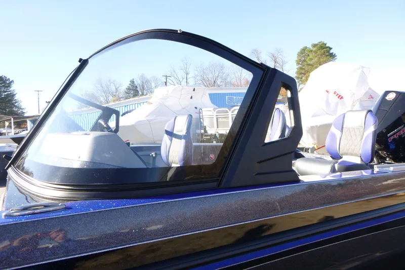 Slide: The Image of 2026 Ranger 621FS Pro boat with sleek windshield and modern seating design. - 7