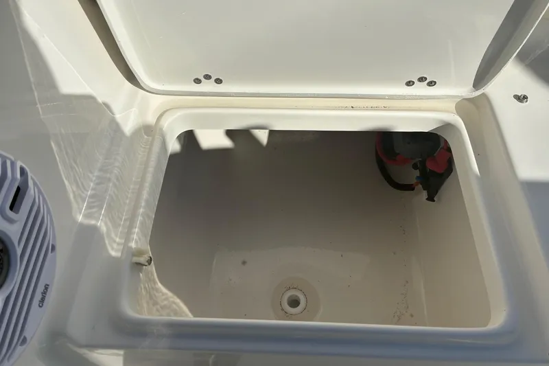 Slide: The Image of Open storage compartment on 2026 Key West 189 FS boat. - 8