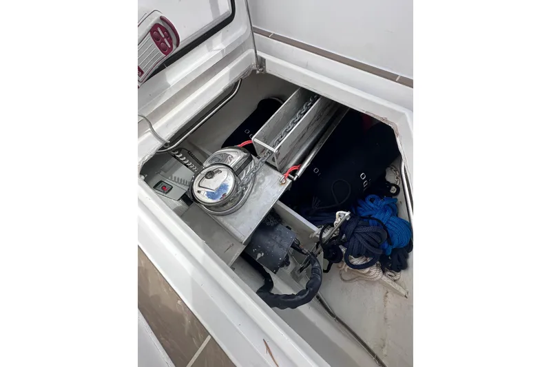 Slide: The Image of Storage compartment of 2024 Pardo Yachts P38 with anchor chain and ropes. - 10