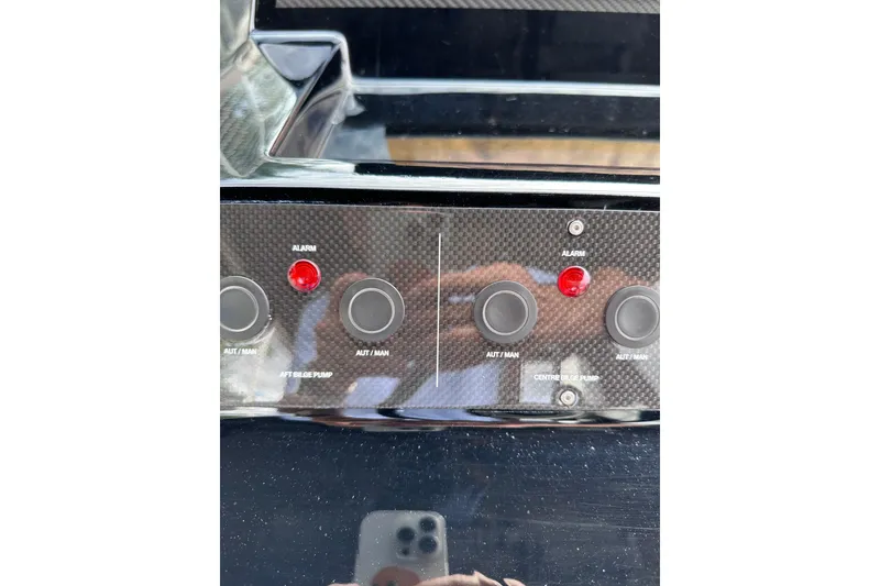Slide: The Image of Control panel of 2024 Pardo Yachts P38 with alarm and bilge pump buttons. - 21