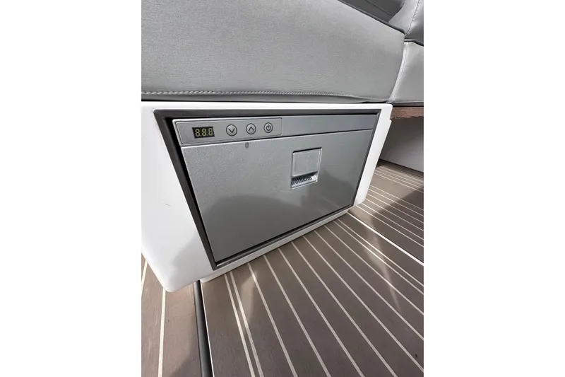 Slide: The Image of 2024 Pardo Yachts P38 interior detail with built-in control panel and seating. - 43