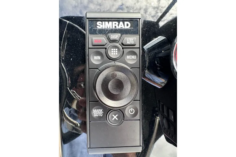 Slide: The Image of Simrad control panel on 2024 Pardo Yachts P38, featuring navigation buttons. - 17