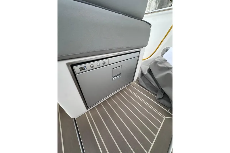 Slide: The Image of 2024 Pardo Yachts P38 interior with built-in refrigerator and modern flooring. - 44