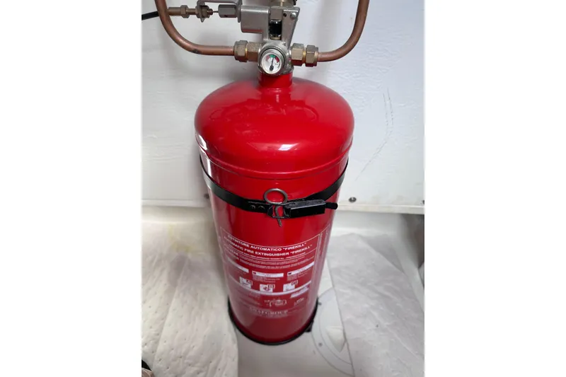 Slide: The Image of Red fire extinguisher in a 2024 Pardo Yachts P38 engine room. - 45