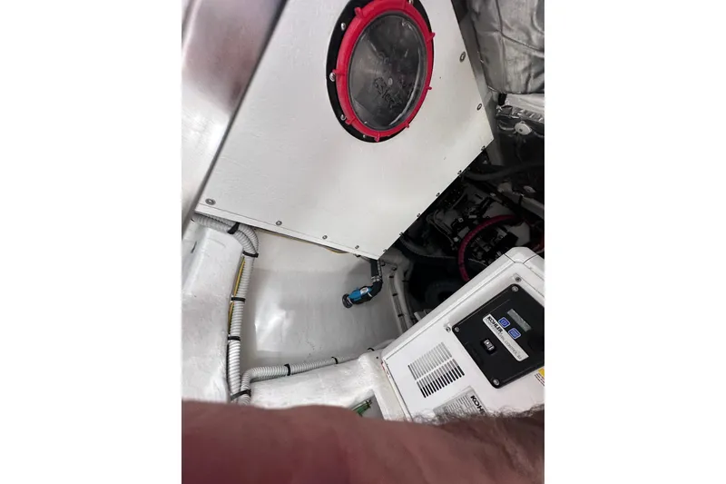 Slide: The Image of Engine room of 2024 Pardo Yachts P38, showcasing mechanical components and wiring. - 51