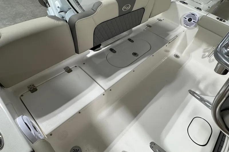 Slide: The Image of Interior of 2026 Key West 189 FS boat, featuring seating and storage compartments. - 15