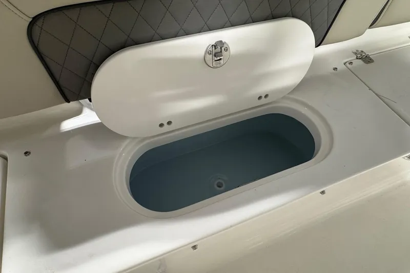 Slide: The Image of Livewell compartment on 2026 Key West 189 FS boat, featuring a sleek design. - 16