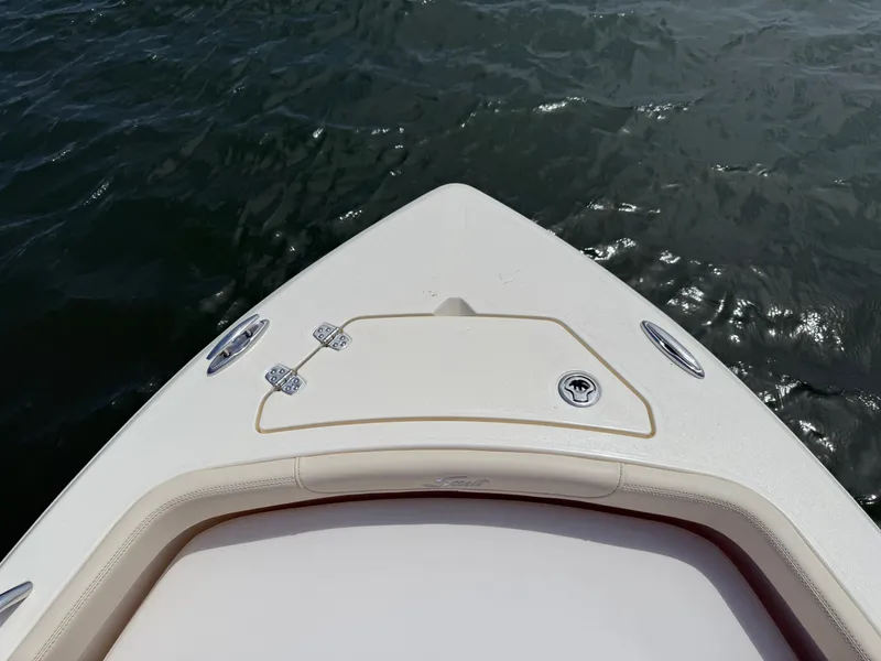 Slide: The Image of Scout 188 Sport Dorado 2026 bow view on water. - 21
