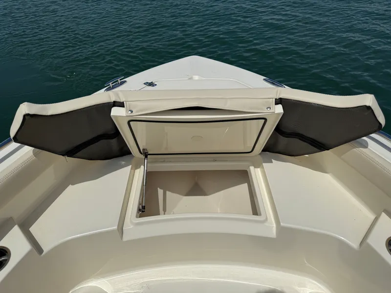 Slide: The Image of Scout 188 Sport Dorado 2026 with open bow storage compartment. - 22