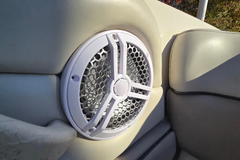 Slide: The Image of Speaker on 2002 Sea Ray 220 Bow Rider boat, integrated in cushioned seating. - 28