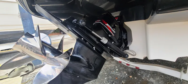 Slide: The Image of Close-up of 2002 Sea Ray 220 Bow Rider boat propeller and engine components. - 41