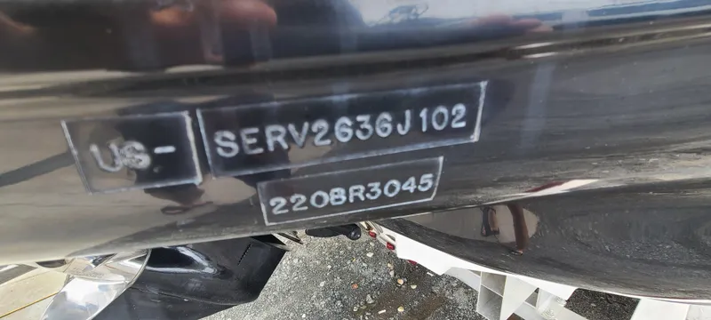 Slide: The Image of Hull identification number on a 2002 Sea Ray 220 Bow Rider boat. - 49