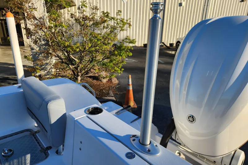 Slide: The Image of 2026 Sportsman Heritage 231 Center Console boat with sleek design and powerful engine. - 25