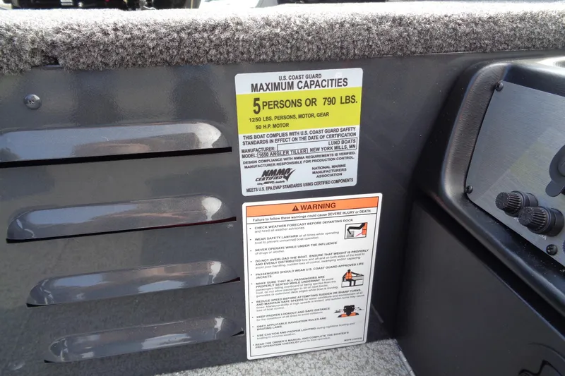 Slide: The Image of 2026 Lund 1650 Angler Tiller boat capacity label, maximum 5 persons or 790 lbs. - 17