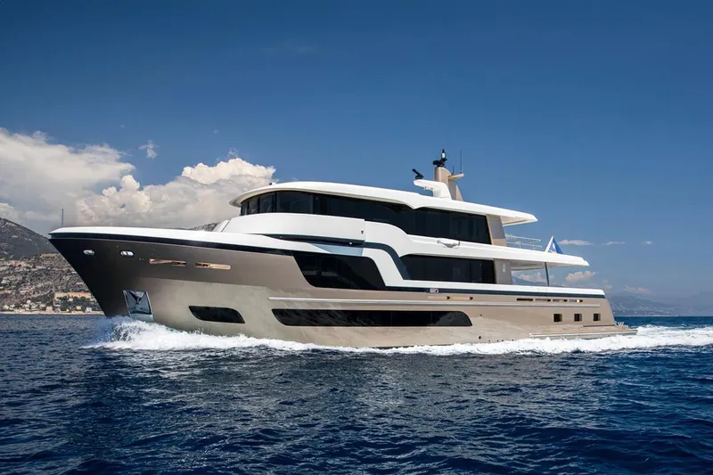Slide: The Image of Luxurious 2021 Van der Valk Custom 34M Explorer yacht cruising on open water. - 7