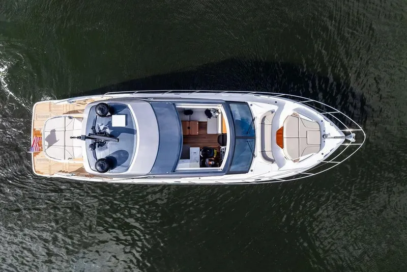 Slide: The Image of Aerial view of 2021 Princess V55 yacht on calm water. - 11