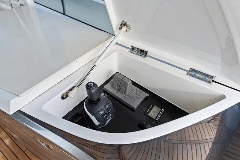 Slide: The Image of Control panel of 2021 Princess V55 yacht, featuring joystick and digital display. - 20