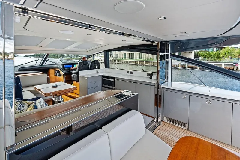 Slide: The Image of Luxurious 2021 Princess V55 yacht interior with modern design and waterfront view. - 22
